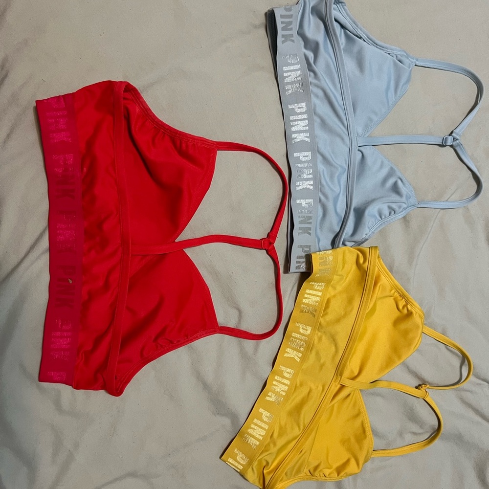 PINK sports bra bundle size mediums powder blue, yellow, and red bundle of 3